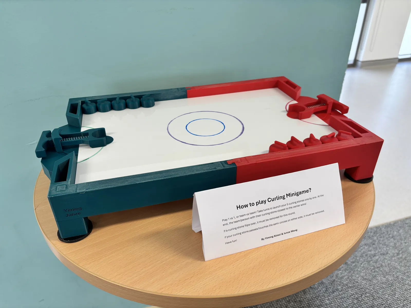 Completed 3D-printed tabletop curling game on display