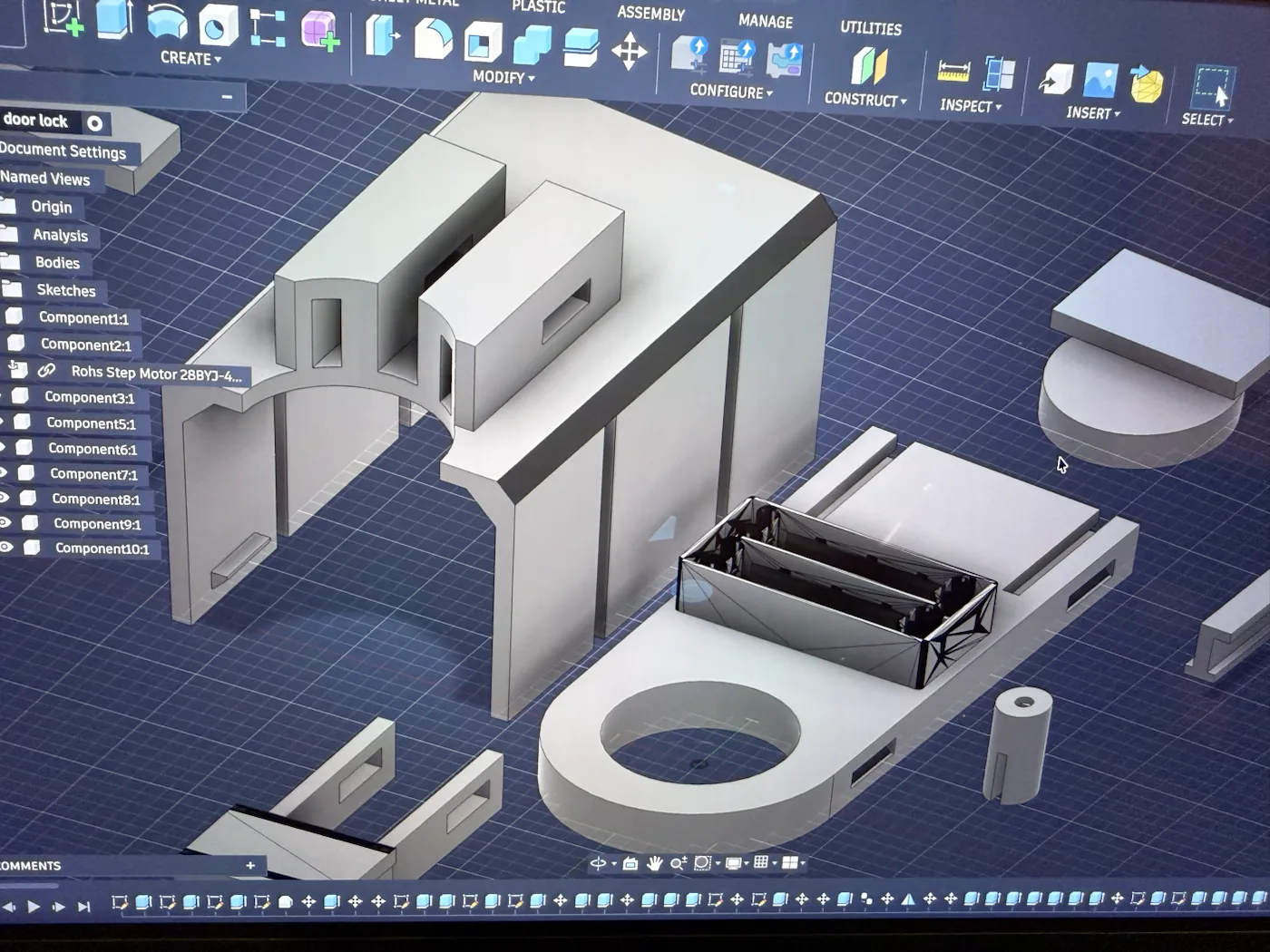 CAD view of the automatic door-lock enclosure components