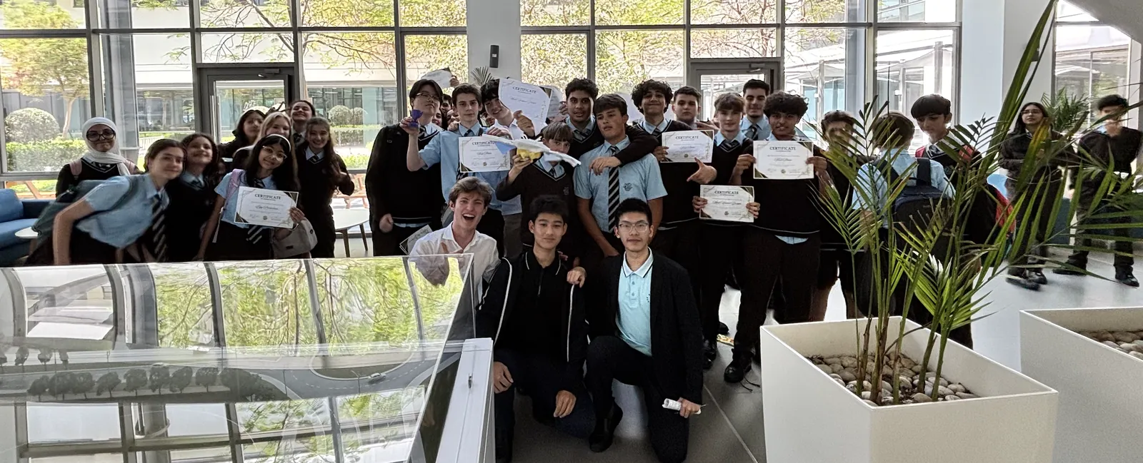 Engineering competition participants holding certificates
